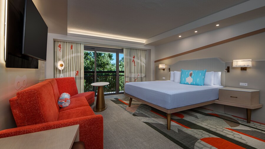 A hotel room with a large bed