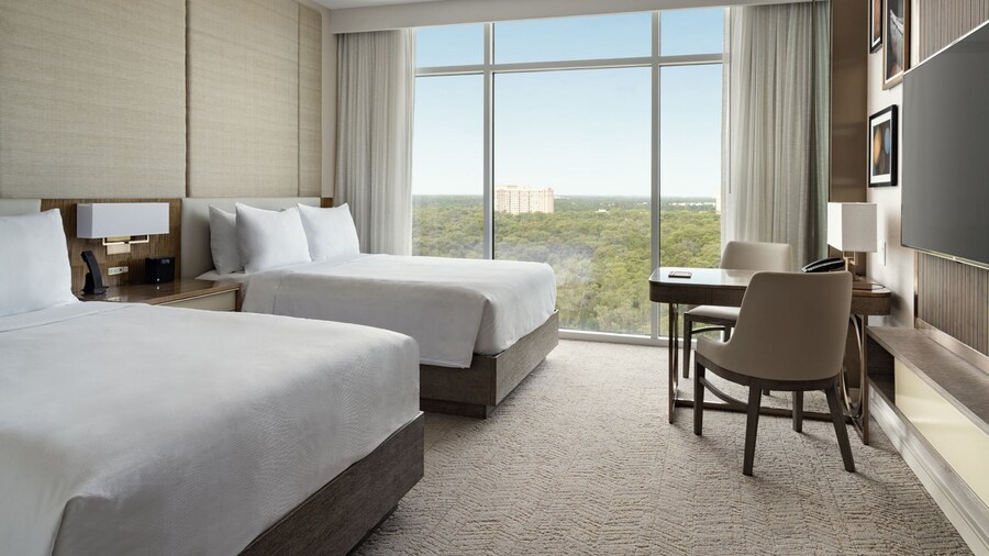 A hotel room with 2 queen sized beds