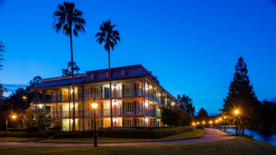 Disney’s Port Orleans Resort French Quarter, a 3 story building surrounded by a walkway and adjacent to the Sassagoula River