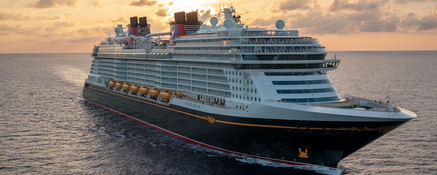 The Disney Wish cruise ship sailing across the sea