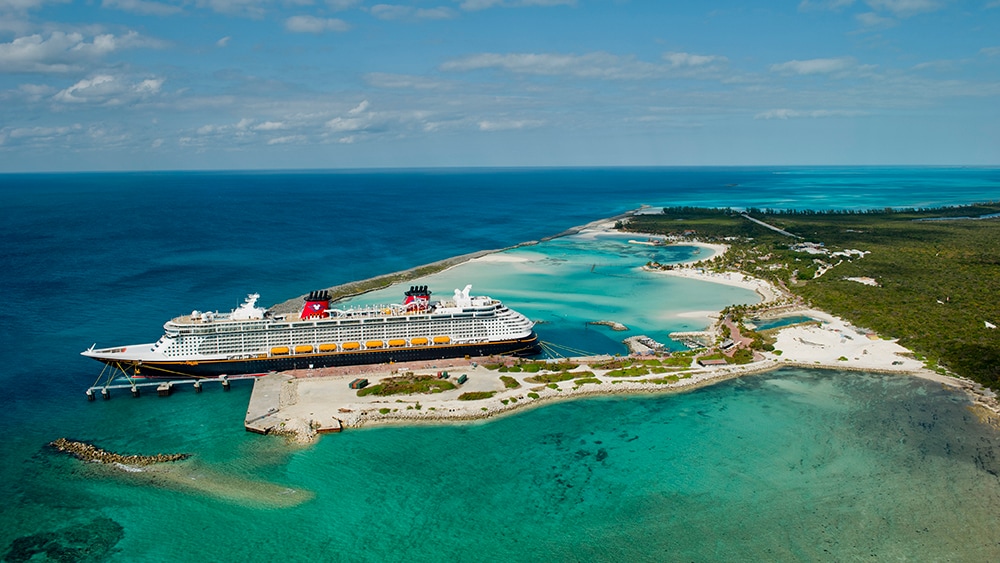 A Disney Cruise ship moored at Disney Castaway Cay