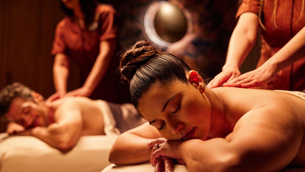 A couple enjoying a relaxing back massage at Tenaya Stone Spa.