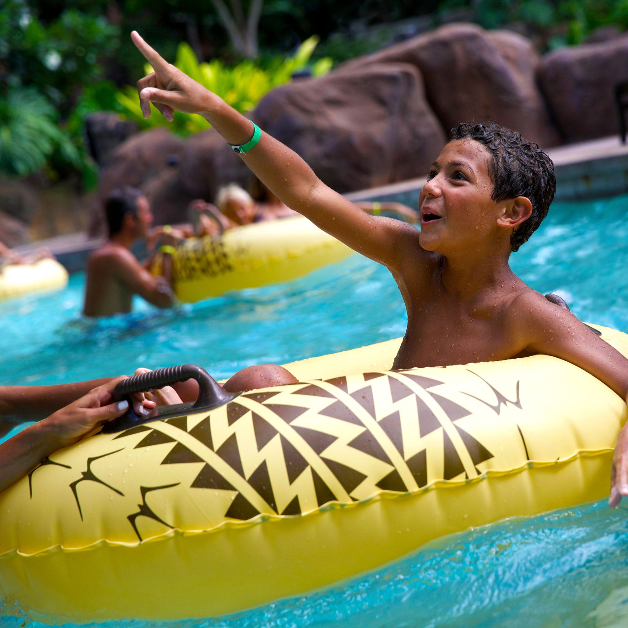 Boy on intertube in lazy river