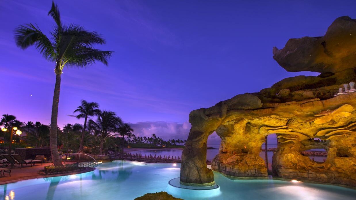 The Ka Maka Grotto pool area, illuminated at night