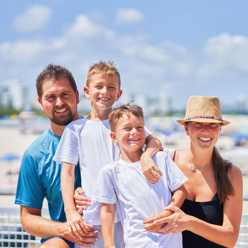 A smiling family of 4 Guests