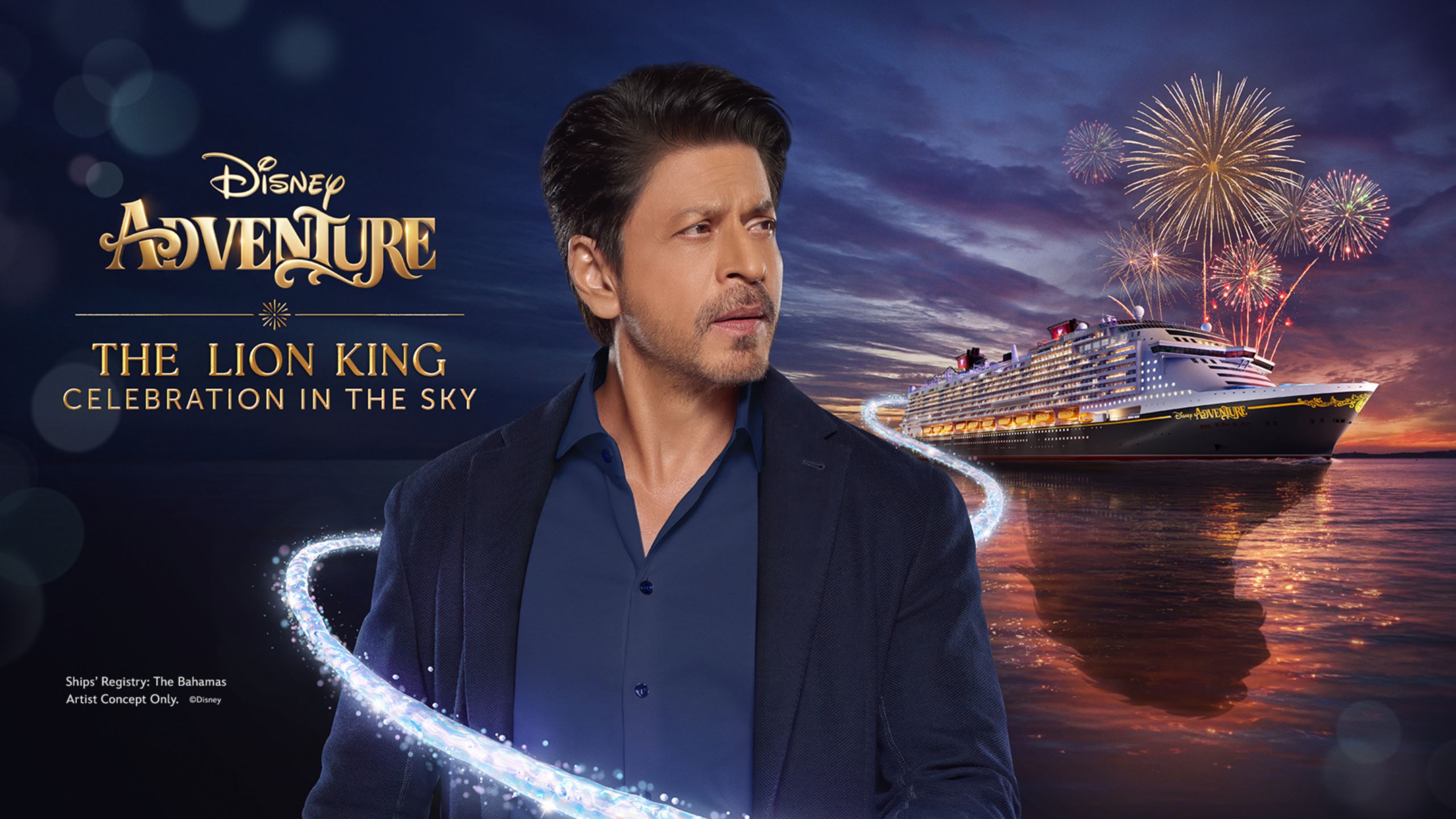Fireworks in the sky above the Disney Adventure ship with a man standing in the foreground next to the Disney Adventure logo and the words ‘The Lion King Celebration in the Sky’