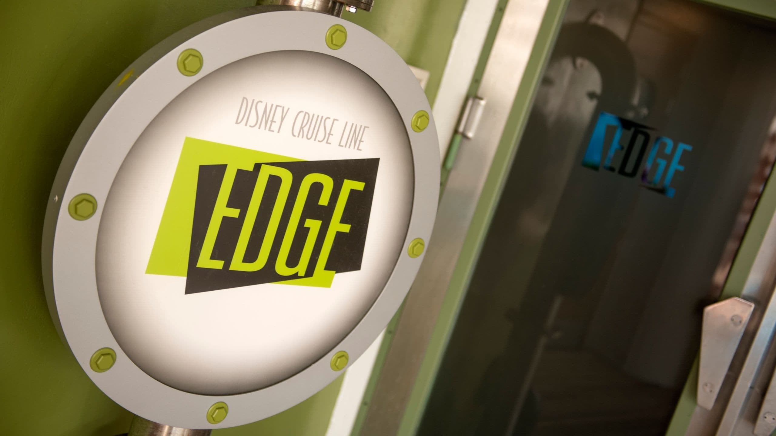 A sign that says, 'Disney Cruise Line Edge', a tween youth club