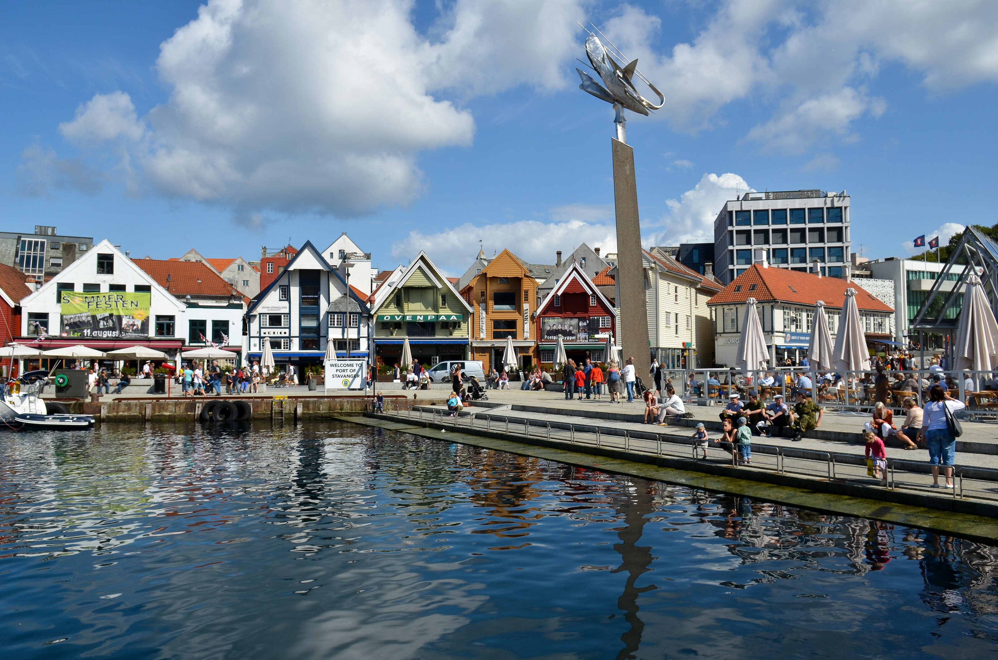 People enjoying the waterfront attractions of Skagenkaien in Stavanger, Norway 