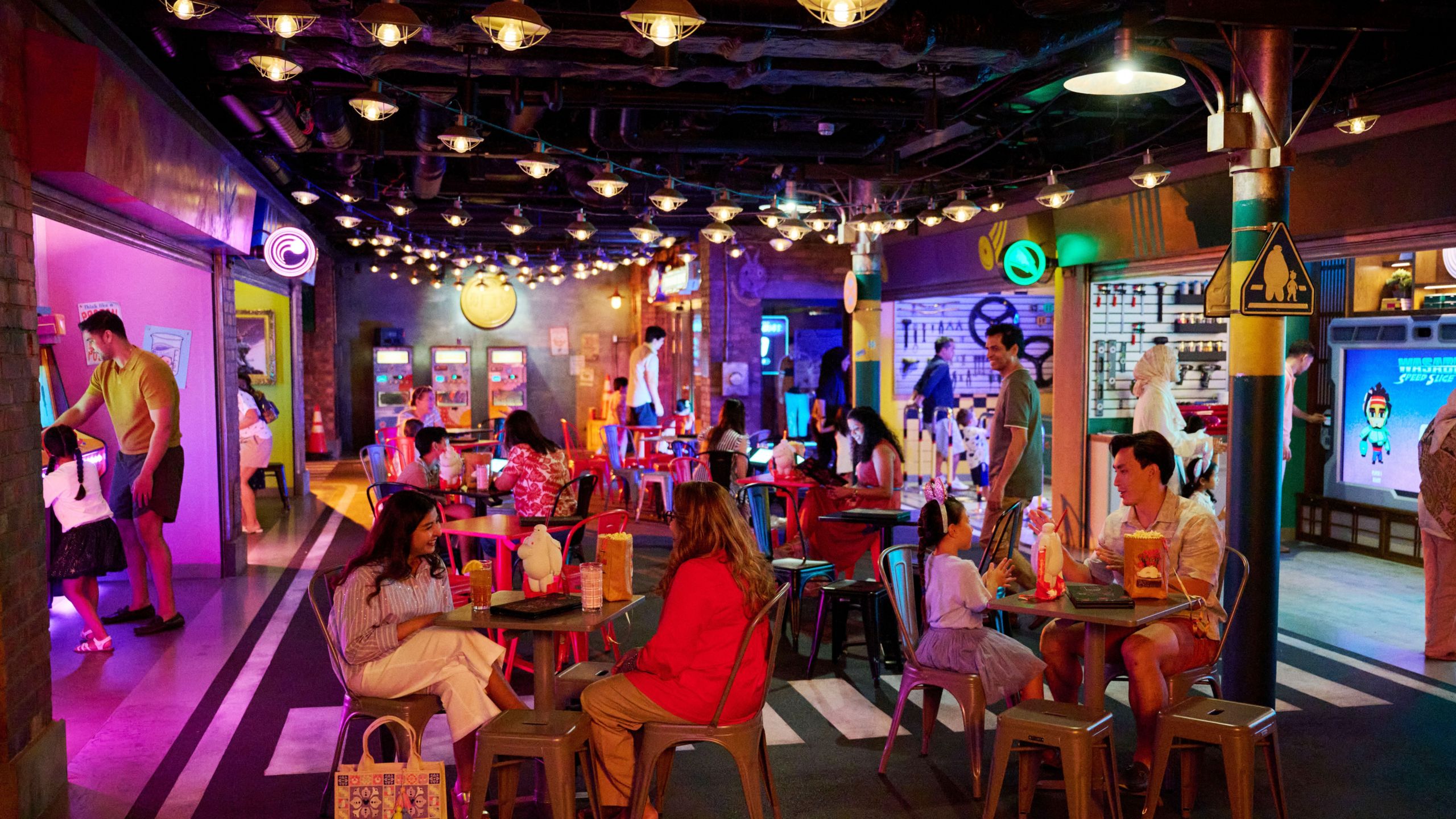 Guests in the San Fransokyo Street area aboard the Disney Adventure cruise ship