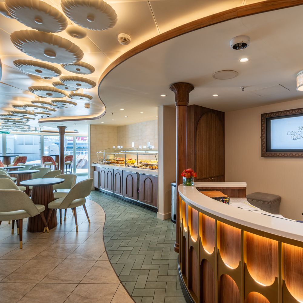 A reception desk in the Disney Magic Concierge Lounge