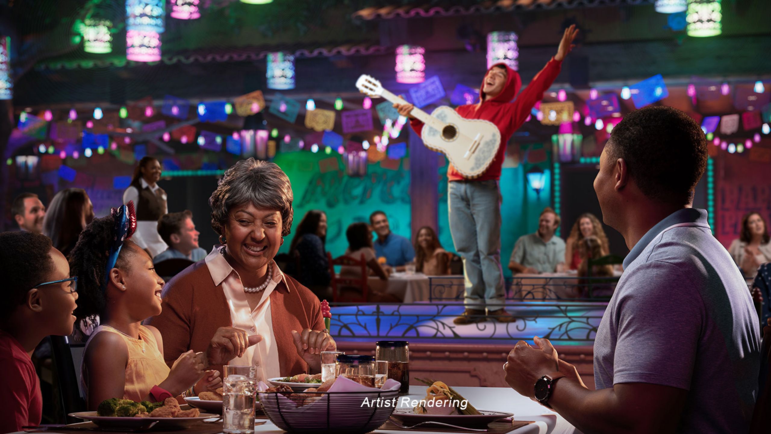 Miguel, do filme da Pixar "Viva – A Vida é uma Festa", se apresentando no palco enquanto avó, pai e dois filhos jantam