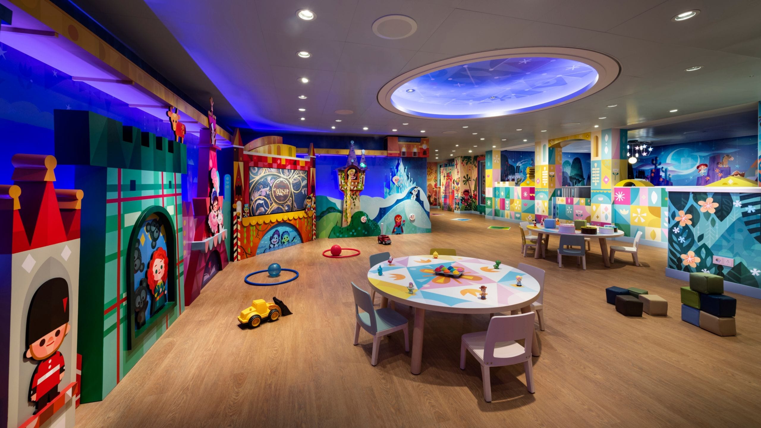 ‘it’s a small world’ nursery with a round table and chairs on board the Disney Wish