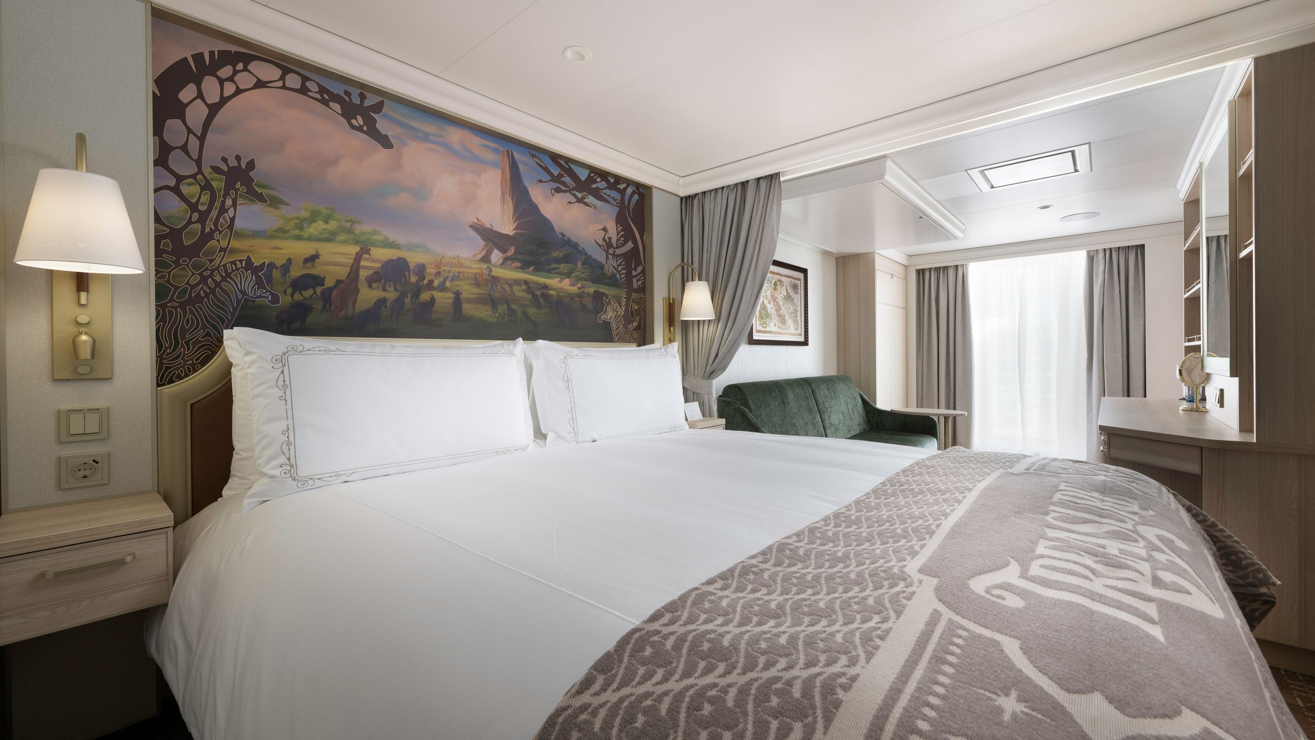 An artist rendering of a Disney Treasure Concierge Family Oceanview with Verandah Stateroom with a bed, a sofa, a vanity and a verandah with an ocean view 