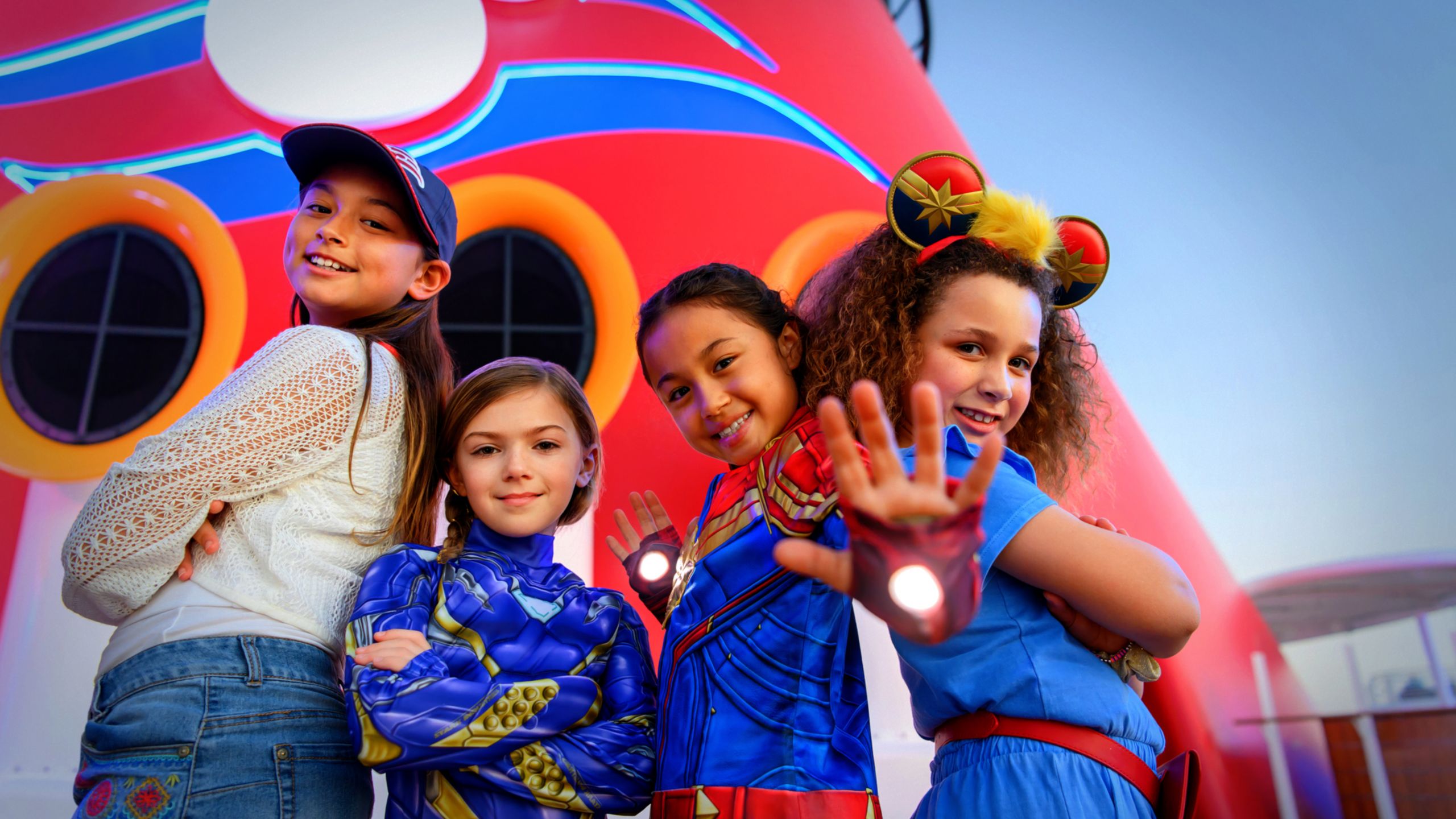 4 kids dressed in Marvel inspired attire