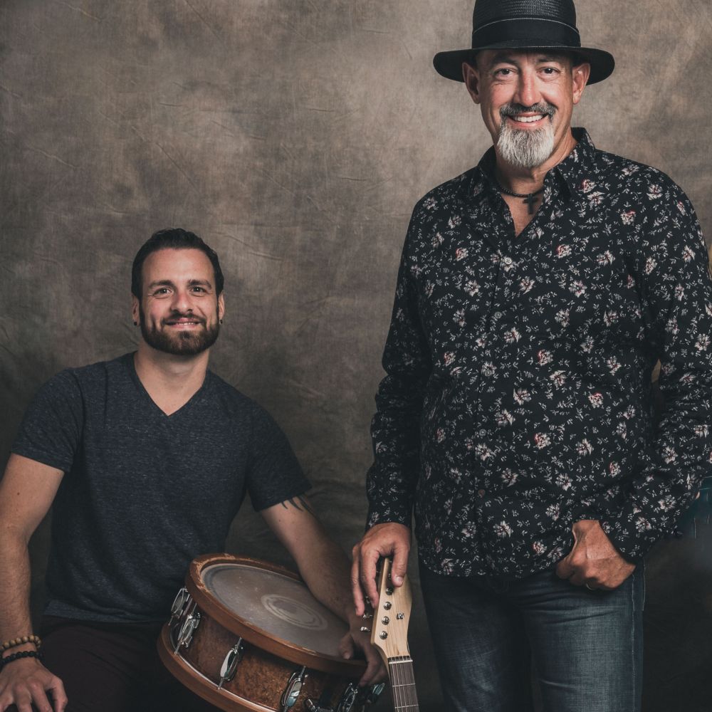 Two musicians from the band Hacksaw Hamlin