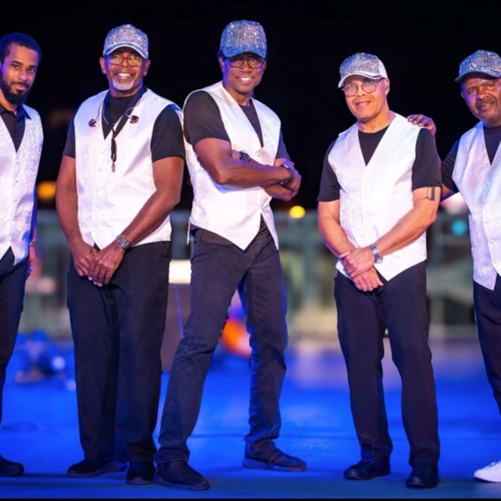 A group of 5 musicians from the Franchise Players band