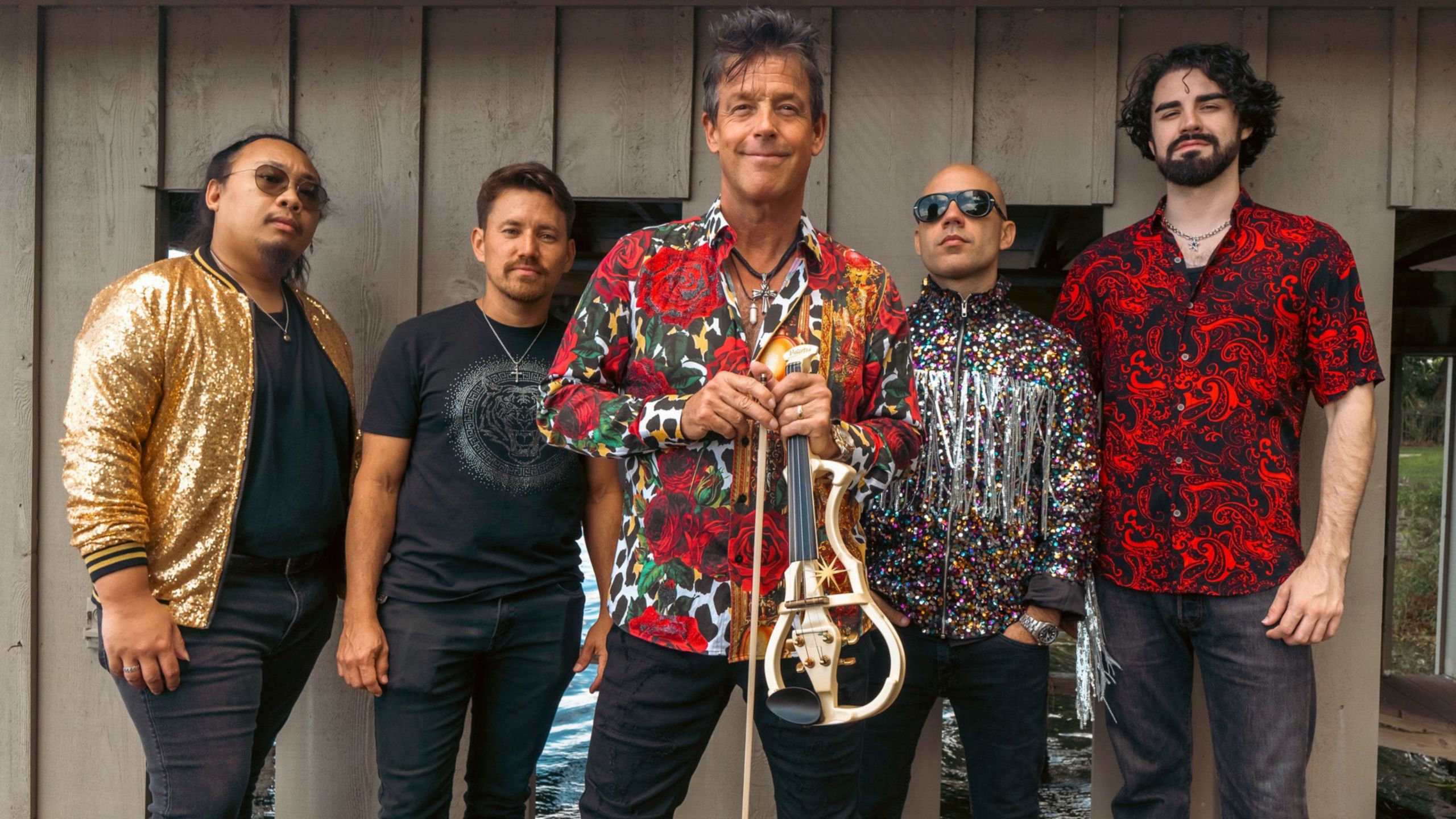 Violinist Gary Lovini, also known as the King of Strings, with his bandmates