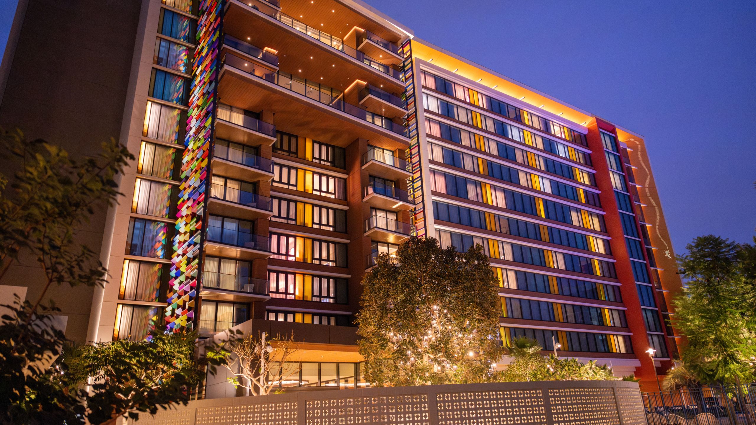 The Villas at Disneyland Hotel building illuminated during the nighttime 