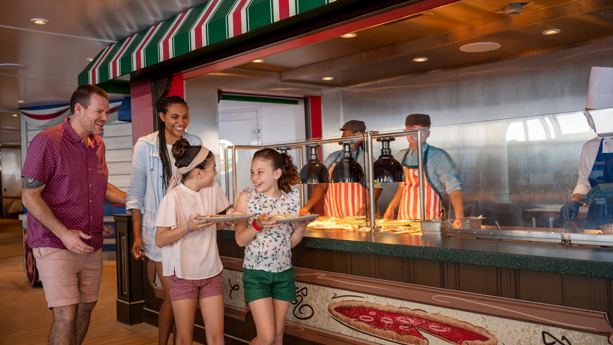 A family ordering pizza from a pizza venue aboard a Disney cruise ship