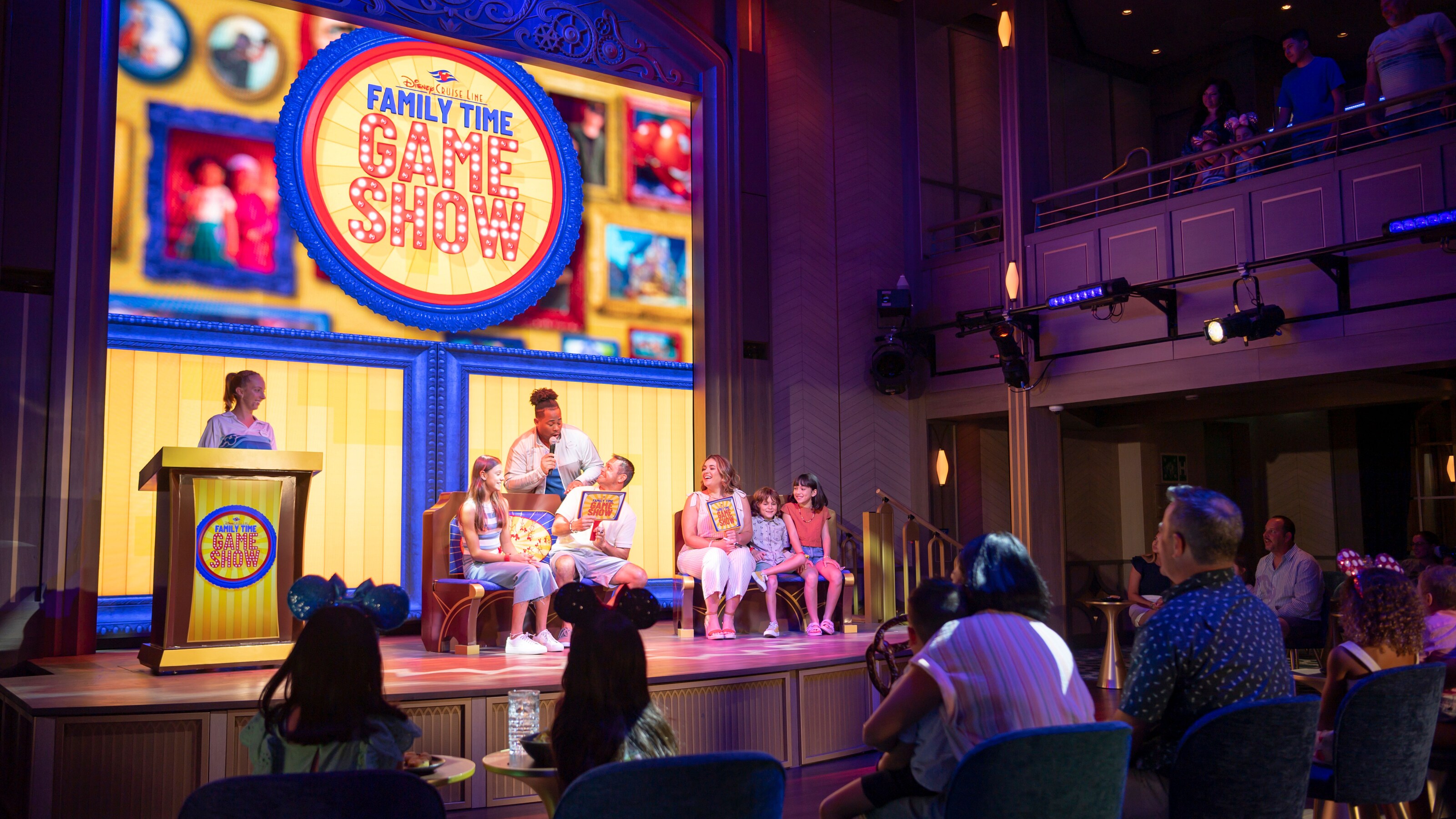 Guests participating in the Disney Cruise Line Family Time Game Show at Luna