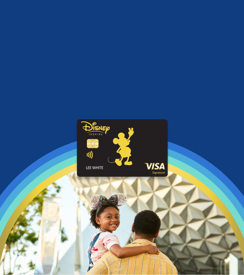 A dad carries his child at EPCOT